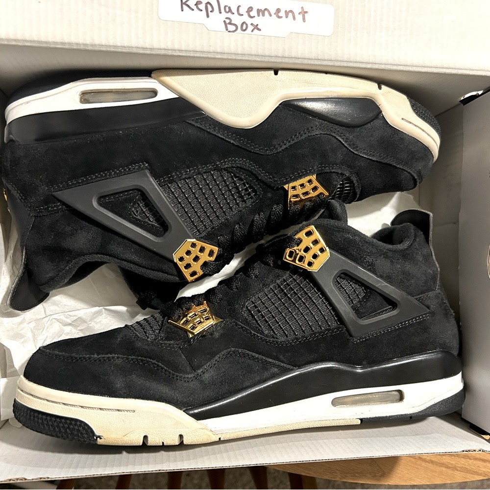 Used Jordan 4 Royalties size 11.5 with replacement box.